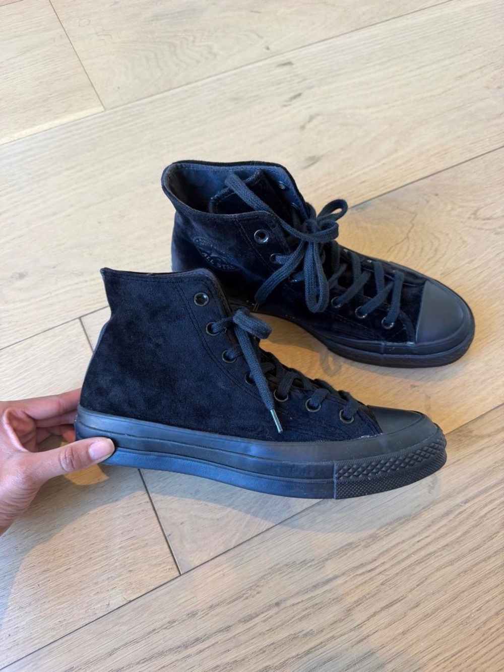 Black suede Converse high top sneakers